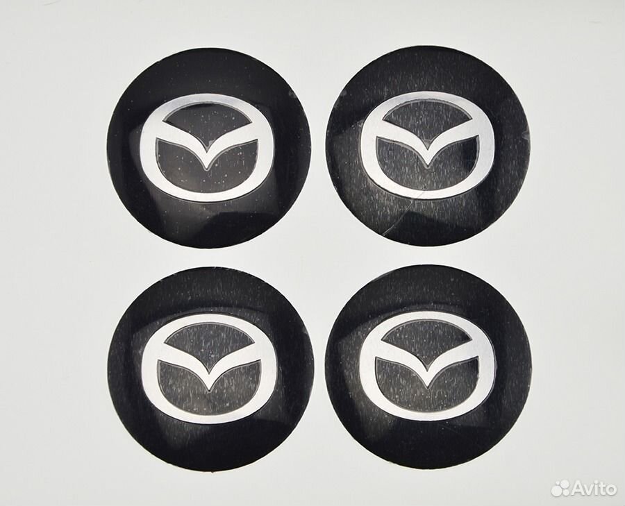 Наклейки на заглушки литых дисков Mazda