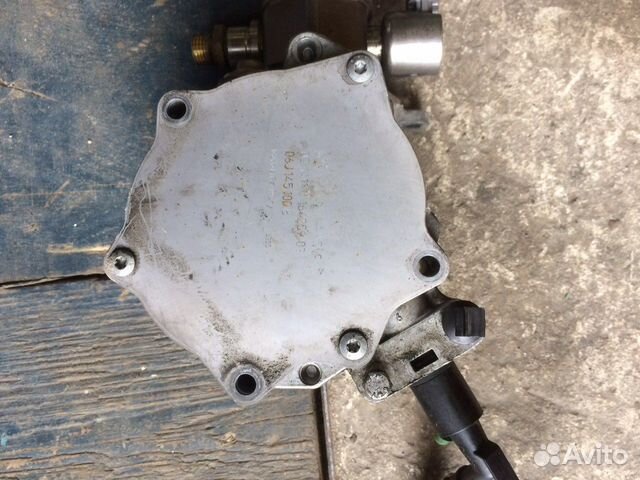 Вакуумный насос Пассат Б7 Б6 1.8 TSI 06J145100 B