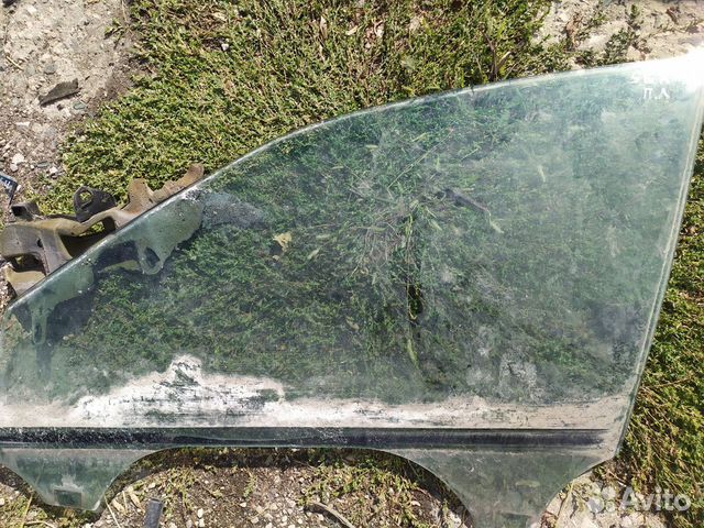 Cadillac SRX 1 стекло двери передней левой