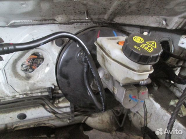 Вакуумник с главным цил/ в сборе Nissan Almera G15