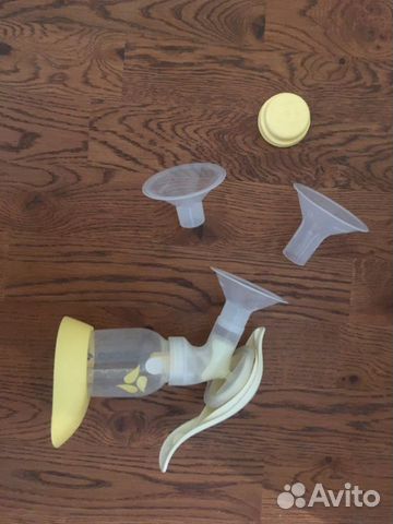 Молокоотсос ручной Medela с насадками Молокоотсос ручной Medela с насадками