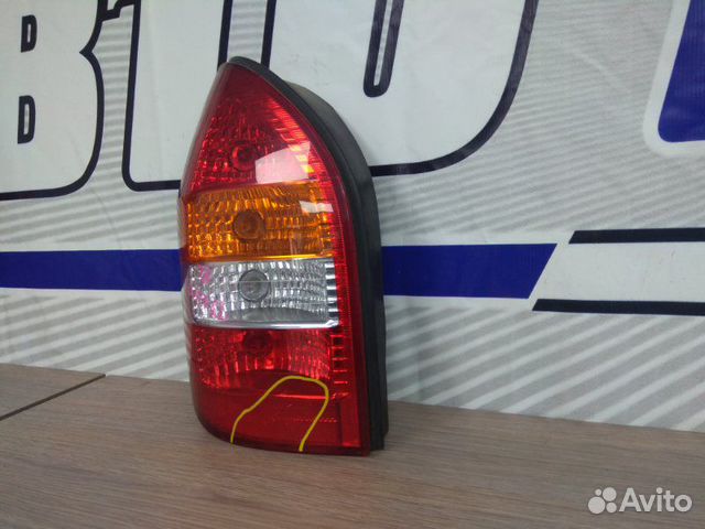 Фонарь задний задний левый Subaru Traviq XM220 Z22