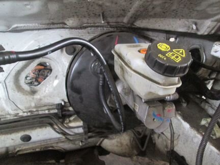 Вакуумник с главным цил/ в сборе Nissan Almera G15