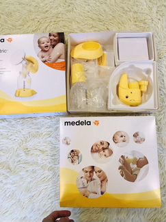 Молокоотсос электрический medela mini