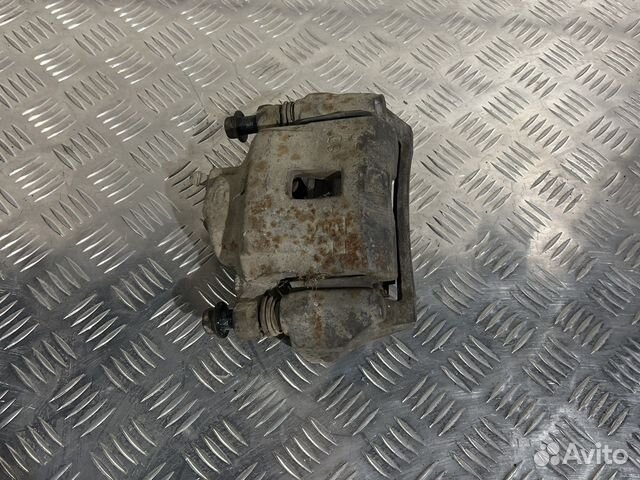 Суппорт передний левый kia spectra