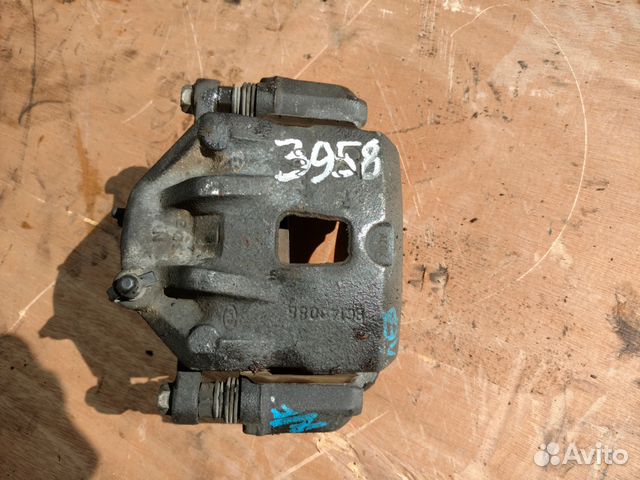 Суппорт передний левый в сборе на NF