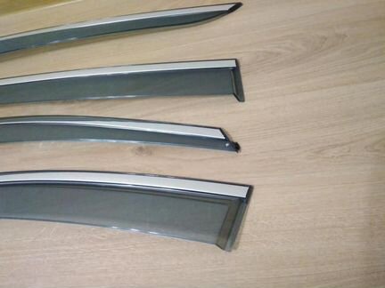 Дефлекторы Kia Rio хром нержавеющий молдинг