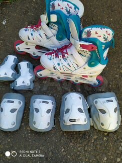 Роликовые коньки