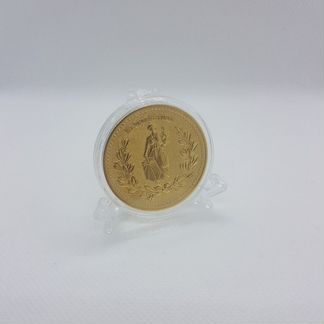 Золотая монета из фильма Джон Уик