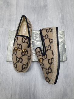 Бежевые зимние мюли Gucci