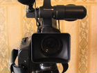 Видеокамера Panasonic HDC-MDH1 (съёмка с плеча)