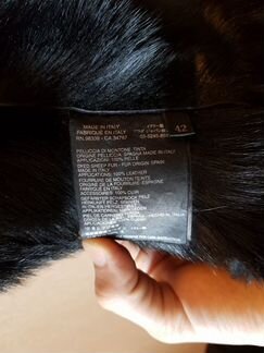 Кожаное пальто с мехом Prada