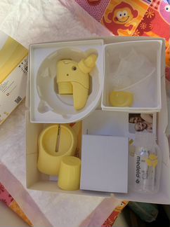 Молокоотсос medela электрический